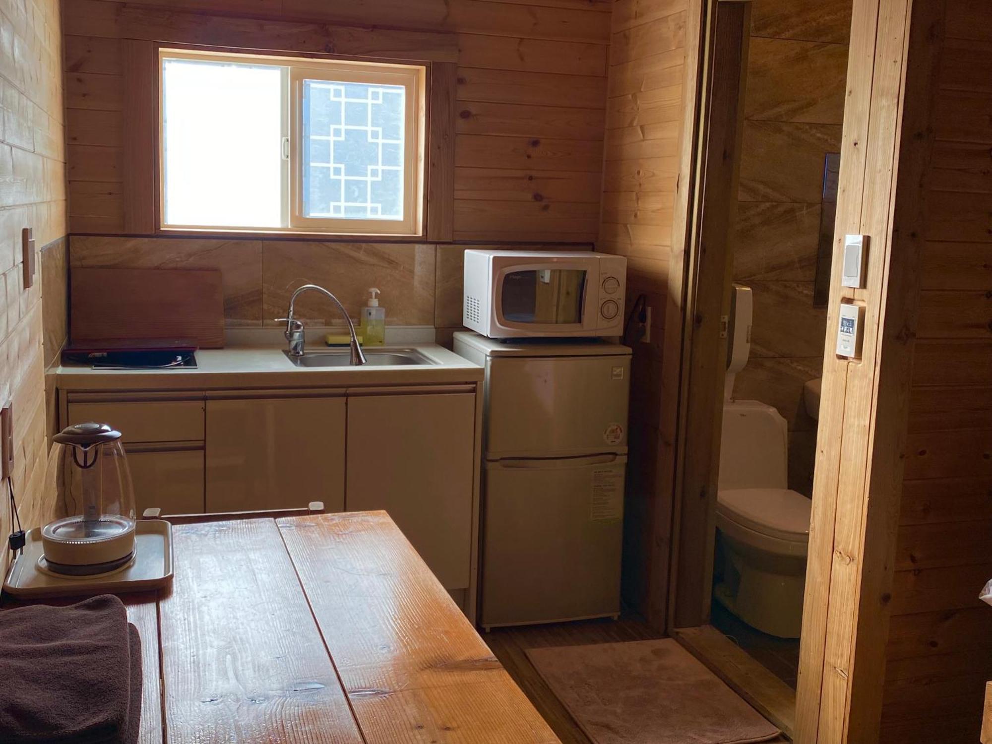 Вилла Log Park Dochidol Ranch Чеджудо Экстерьер фото